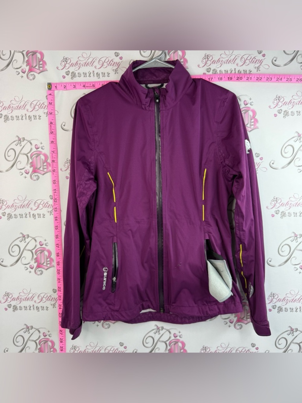 Sunice jacket lightweight fits in bag Purple Women's Jacket with Yellow Accents